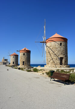 Historical windmills at the harbour in Rhodes, Greece