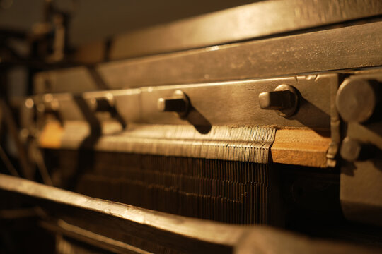 metal hooks on an old, historic loom