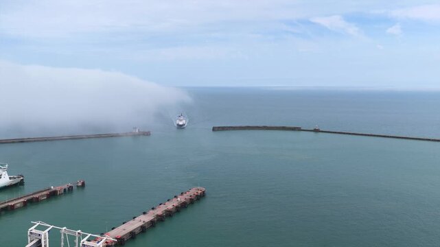 Ferry Approaching Dover Sea Walls Aerial 4K