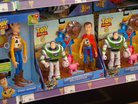 Palma de Mallorca, Spain - June 20, 2026: Toy Story 5 deluxe Woody and Buzz Lightyear action figures and character playsets on retail display. Toys R Us store, Mattel, Disney Pixar, talking figure.