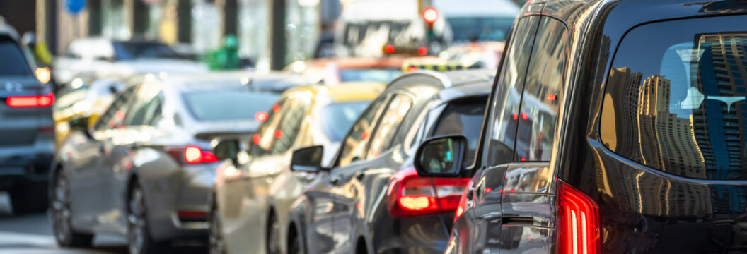 Heavy urban traffic congestion during weekday rush hours, with long queues of vehicles, illustrating commuting delays, city infrastructure pressure, and daily transportation challenges.