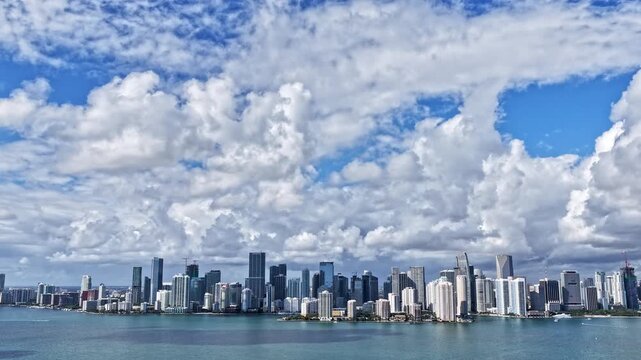 Brickell Key Miami. Skyscraper building architecture. Cityscape skyscraper. Hyperlapse skyline cityscape. City hyperlapse. City downtown with skyscraper. Aerial Miami hyperlapse. Big city