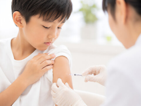 ワクチン接種を受ける小学生の医療イメージ