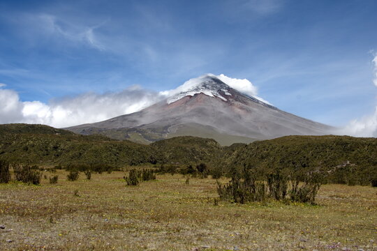 Cotopaxi Volcano erupting with an ash plume, in Cotopaxi National Park, in Ecuador