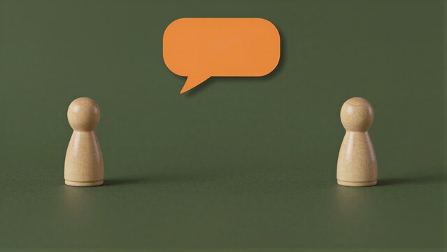 Two wooden figures face each other with an orange speech bubble above.