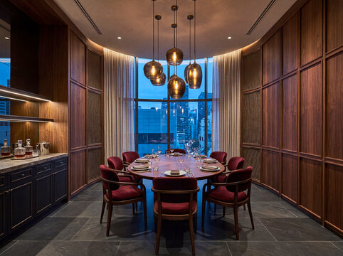 Luxury private dining room with elegant table setting and warm light