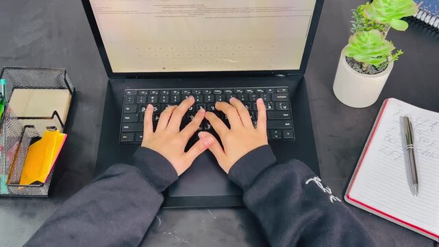 Programming and coding on laptop, 16:9 widescreen footage, software developer working, professional desk setup, digital workflow, computer keyboard, productive lifestyle, study session.