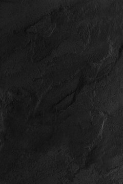 Dark grey black slate background or texture