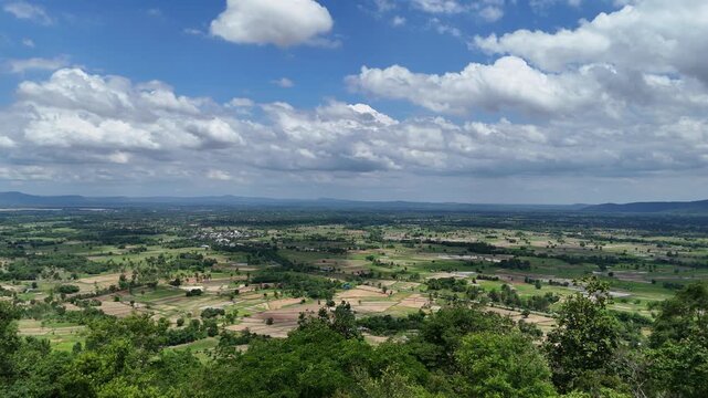 High angle scenic view of Kalasin basin and Phu Phan mountain range from Sakon Nakhon, Thailand.