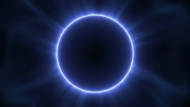 Glowing neon blue circle ring on a dark black background