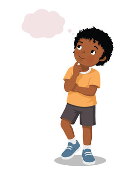 Little African boy daydreaming thinking about something looking up

