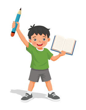 Little boy holding big pencil and opened book