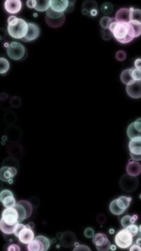 ピンクと青のツートンカラー粒子が縁取る縦型ループ背景