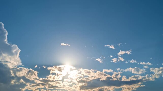Sky time lapse. Cumulonimbus cloud movement. Moving clouds and sun. 4K Time lapse. The Sky with clouds. Cloud cloudscape time-lapse. Blue sky time lapse. Nature weather with blue sky.