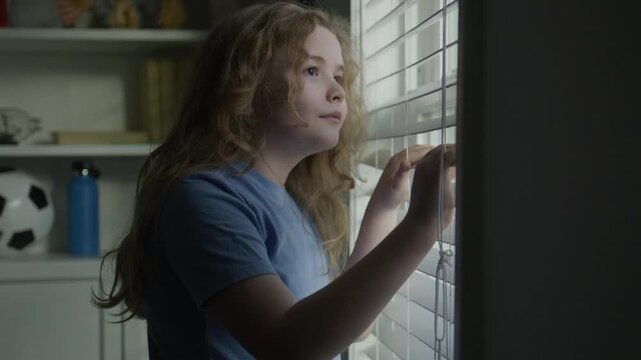 Child watching light outside. Child thinking quietly inside. Child feeling calm mood. Child imagining next day.