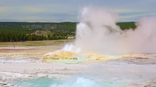 Clepsydra and Spasm geysers erupt simultaneously along Fountain Paint Pot Trail in Yellowstone National Park