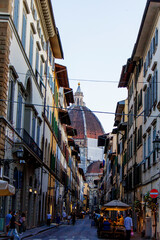 Obraz premium The Duomo of the Cattedrale di Santa Maria del Fiore Seen From a Narrow Street, Florence, Italy