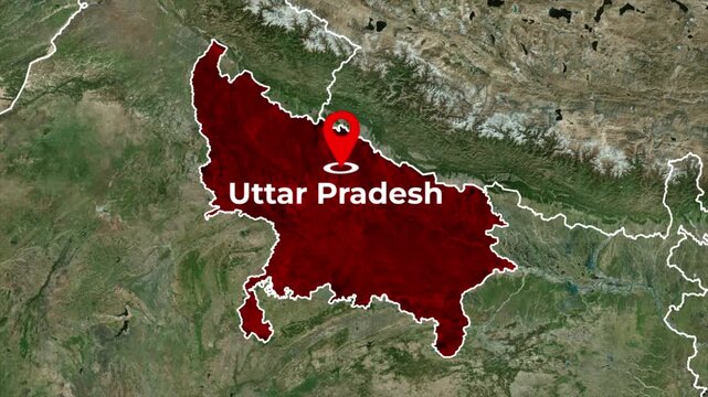Zoomed in satellite terrain map animation of India highlighting Uttar Pradesh state in red with a red location pin icon and blinking target dot