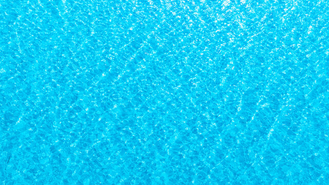 Title	
Top view of deep blue sea water surface with small ripples, aerial drone shot of turquoise ocean texture at island , abstract nature background	
