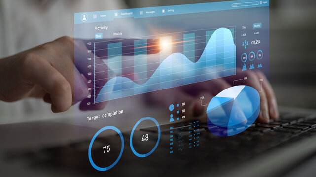 A professional working on a laptop, engaging with a modern analytics dashboard showcasing real-time data, metrics, and performance insights for informed decision-making. Impute