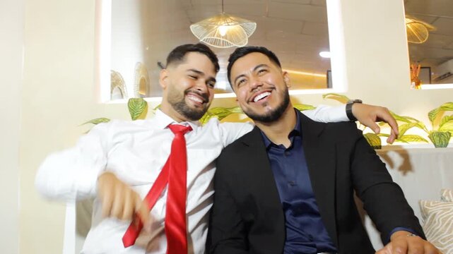 Portrait of two young Colombian men planning a future for a business on the stock exchange abroad in a coworking space in Neiva, Huila, Colombia. Concept of businessmen and projection