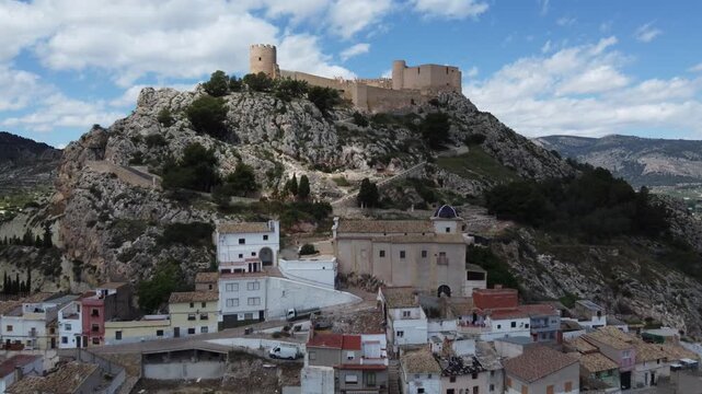 The castle, Hermitage of the Blood, and old town of Castalla, Spain.