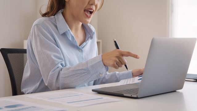 Bad Gen Z boss video call work argue point face stress yelling anger hate speech. Asia people woman fight on laptop videocall upset mad bossy. Online job issue mental health illness burnout at office.