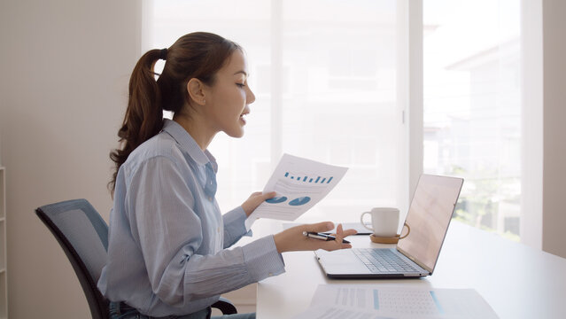 Bad Gen Z boss video call work argue point face stress yelling anger hate speech. Asia people woman fight on laptop videocall upset mad bossy. Online job issue mental health illness burnout at office.
