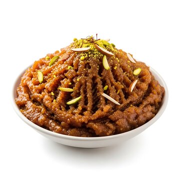 Halwa dessert in a bowl topped with pistachios