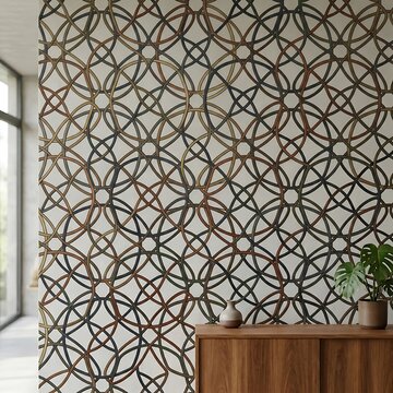 Wallpaper featuring a repeating geometric pattern of interlocking circles and thin lines in bronze, black, and white on a clean wall surface