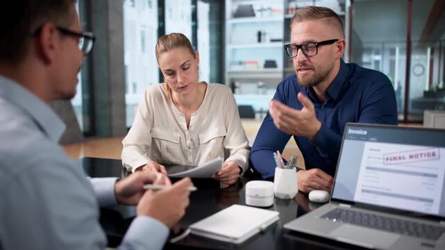 Debt Collector Carefully Reviews Overdue Bills