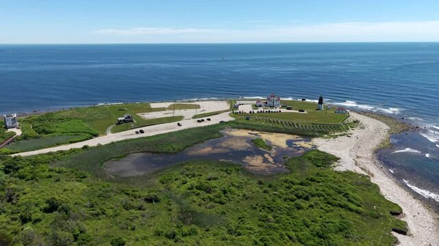 U.S. Coast Guard Station And Lighthouse At Point Judith In Narragansett, Rhode Island, United States. Aerial Wide Shot