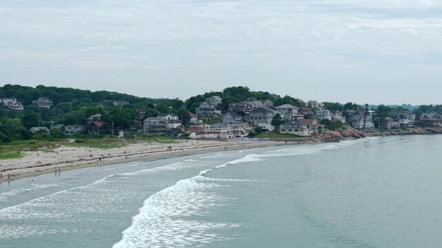Residential Coastal Homes At Good Harbor Beach In Gloucester, Massachusetts, USA. Aerial Ascending Shot