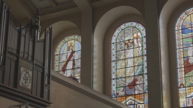 4K S-Log medium interior shot of Sto. Domingo Church in Quezon City, Philippines, highlighting the nave, altar area, and detailed Catholic church architecture in a peaceful atmosphere.