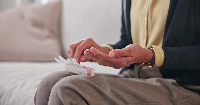 Retirement, sorting or hands in house with pillbox, treatment plan or dosage in wellness. Medication, medical or old person with container, prescription organizer or drug routine in health management