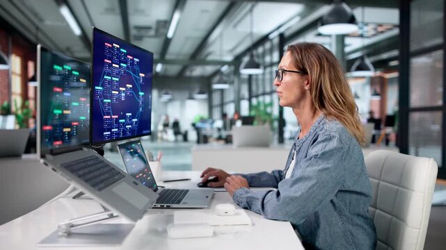 Business Analyst Uses Low Code Platform On Laptop