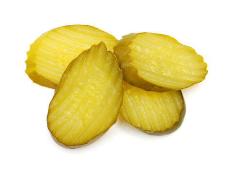 Fresh sliced green pickles isolated over white 