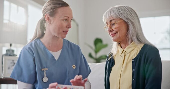Pills, talking and nurse with old woman on sofa for heart medicine schedule, retirement and support. Medication reminder, help and medical advice with elderly person and caregiver in home for dosage
