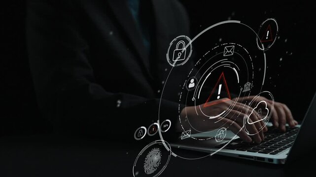 Concept of digital security and risk management with hands on a laptop, alert symbols, and visuals representing data protection, technology, and cybersecurity. Entropy.