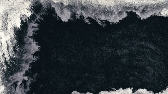 A dark, abstract ink wash with frothy, textured edges