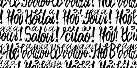 Hand lettered hello greetings pattern on a white background © Tapan