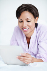 Relax, woman and happy with tablet on bed for watching series, online tv show and weekend break. Smile, african person and digital tech in home for streaming film, movie subscription or entertainment