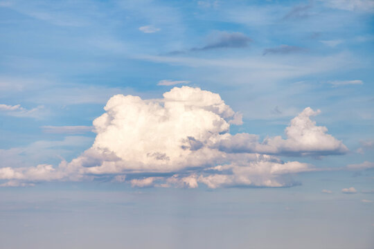 Clouds Drift in a Bright Sky With Minimal Features and Wide Open Space