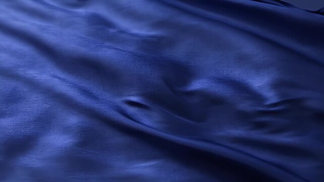 Abstract Dark Blue Fabric Flowing Gently with Smooth Waves and Ripples.