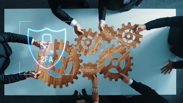 A group of professionals collaborates over wooden gears while integrating digital security concepts, highlighting teamwork and technology in a modern business environment. Raster