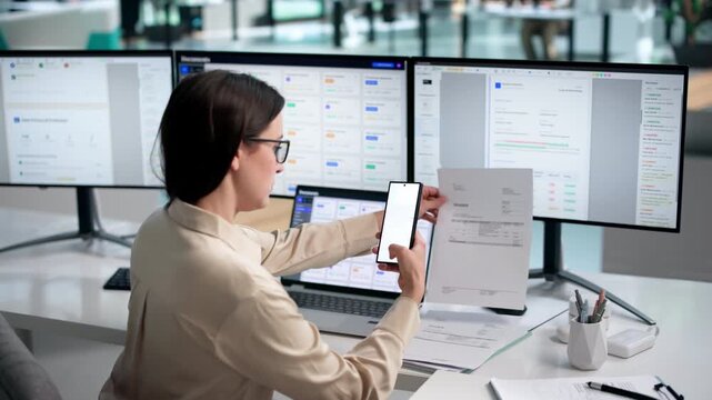 Person Holds Phone To Capture Document