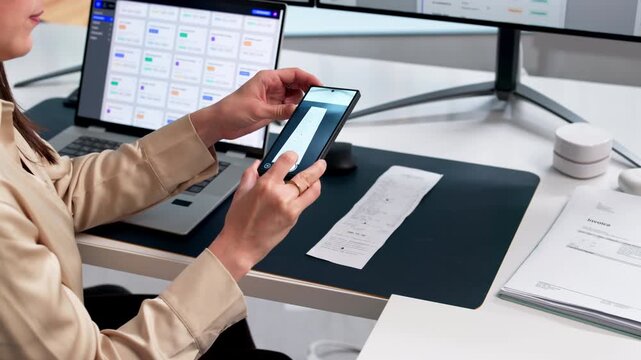Person Uses Smartphone To Scan Receipt