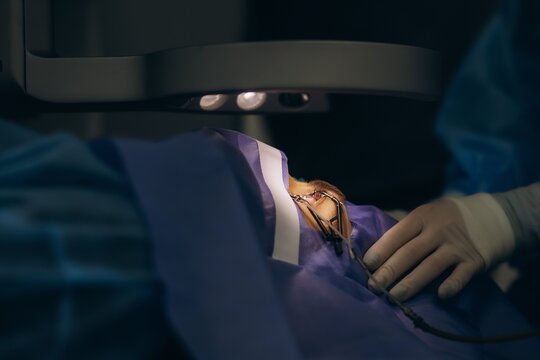 Ophthalmic laser eye surgery on patient for vision correction
