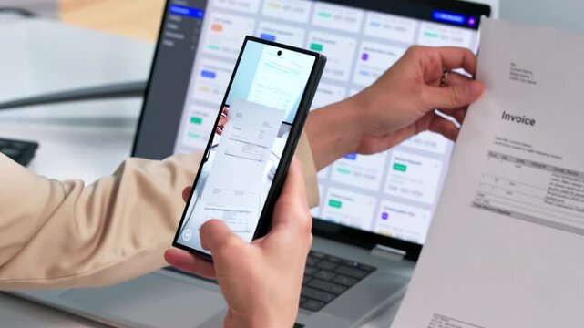 Office Worker Scans Documents Using Smartphone