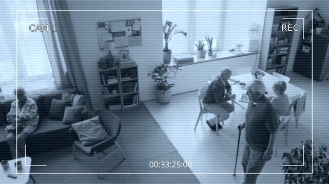 Seniors in daily activities inside retirement home, captured by CCTV security camera. Clip for promoting elder care safety, surveillance systems, and smart home technology